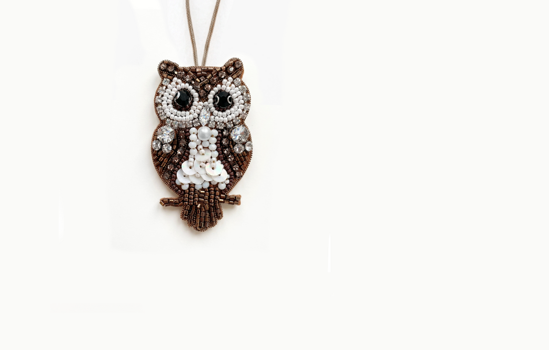 Brown beaded owl bag charm
