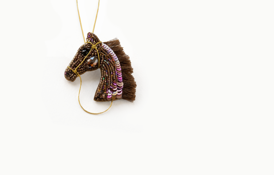 Brown beaded horse head bag charm with a sequin mane