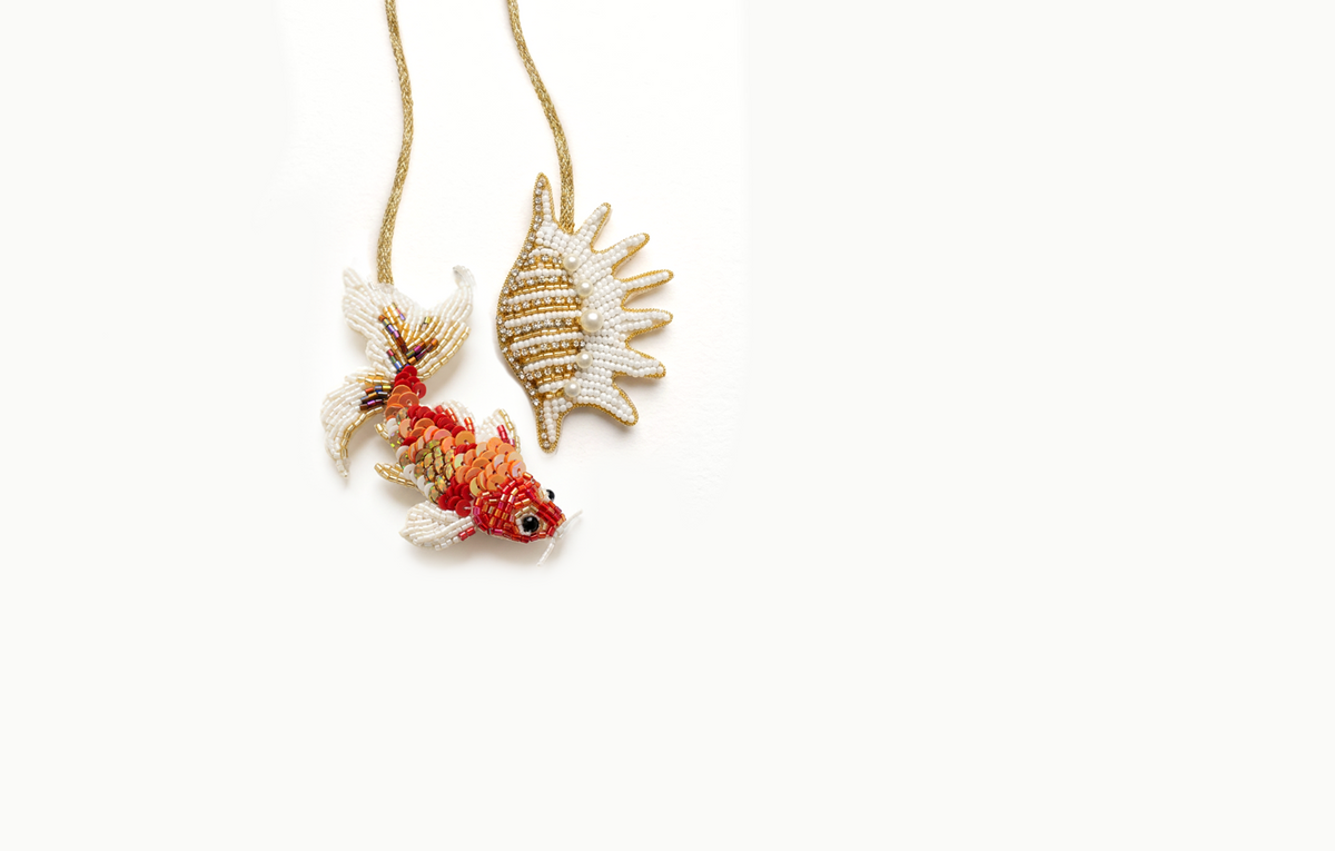 Orange sequined koi fish and beaded shell bag charm