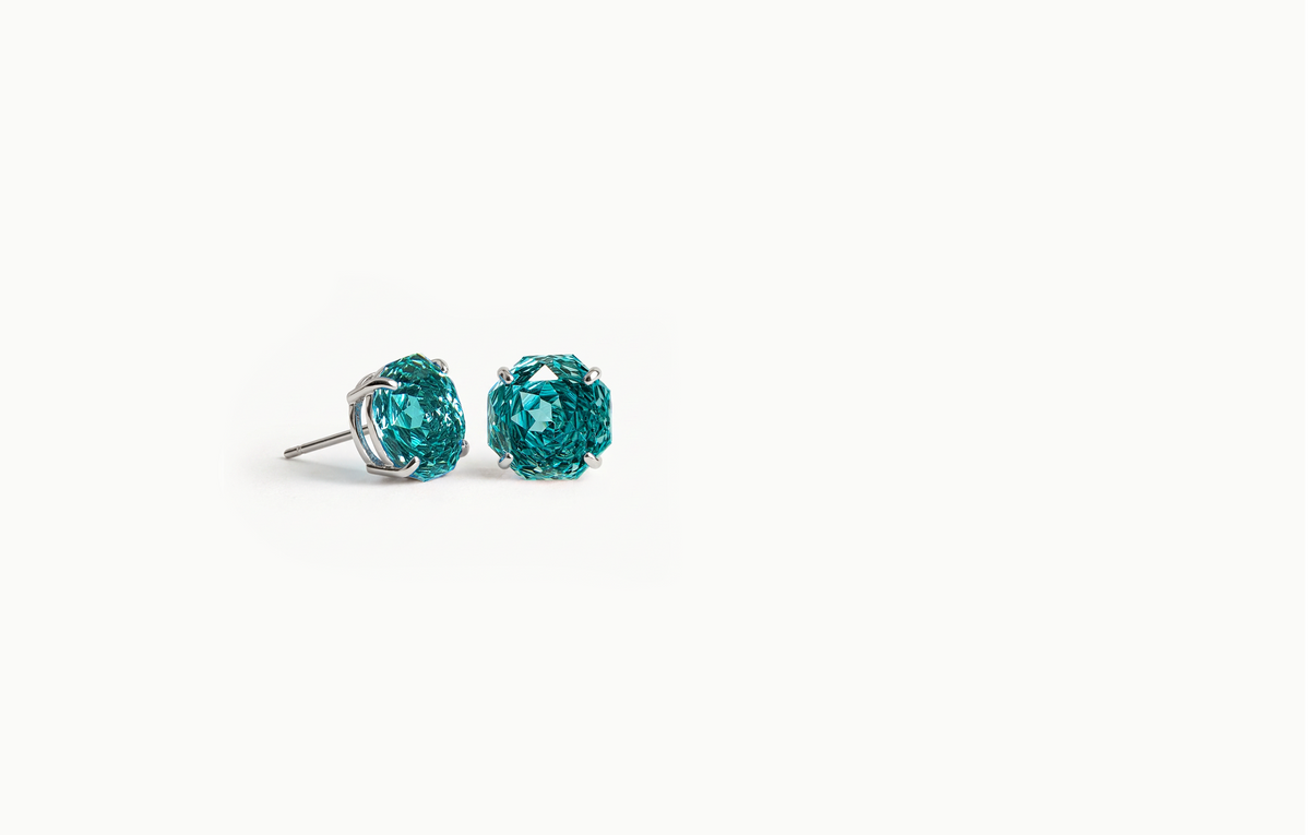 Large teal Portuguese cut crystal stud earrings in a silver setting