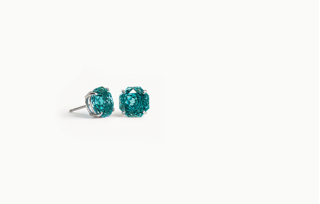 Large teal Portuguese cut crystal stud earrings in a silver setting