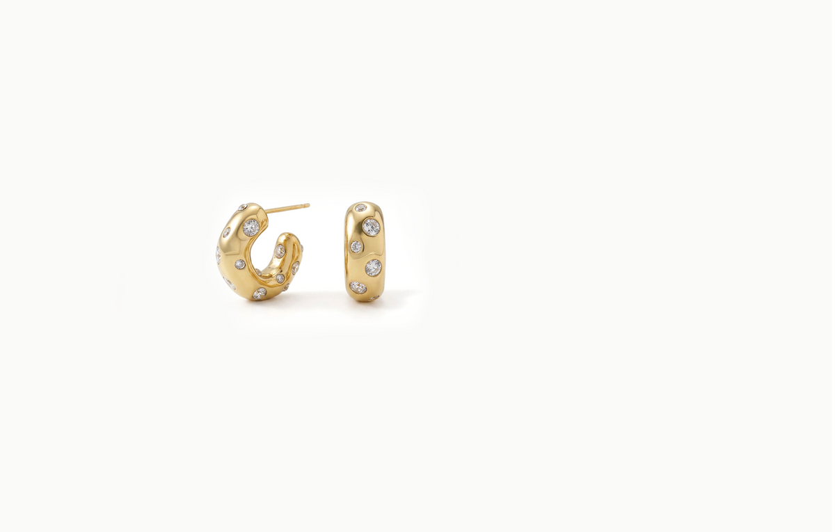 Chunky gold hoop earrings spotted with crystals