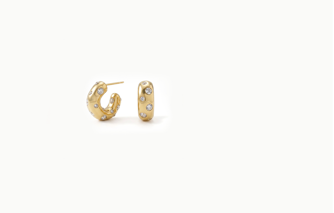 Chunky gold hoop earrings spotted with crystals