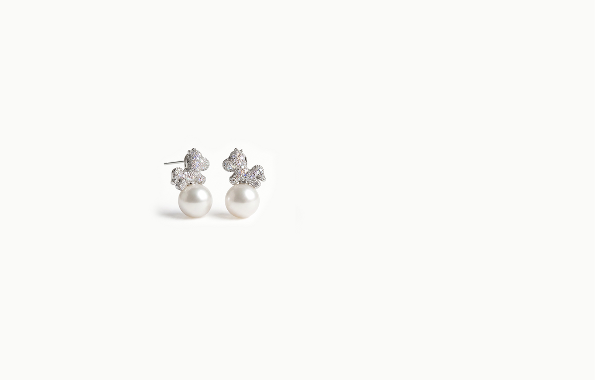 Silver crystal horse stud earrings with a large pearl