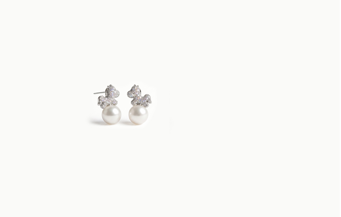 Silver crystal horse stud earrings with a large pearl