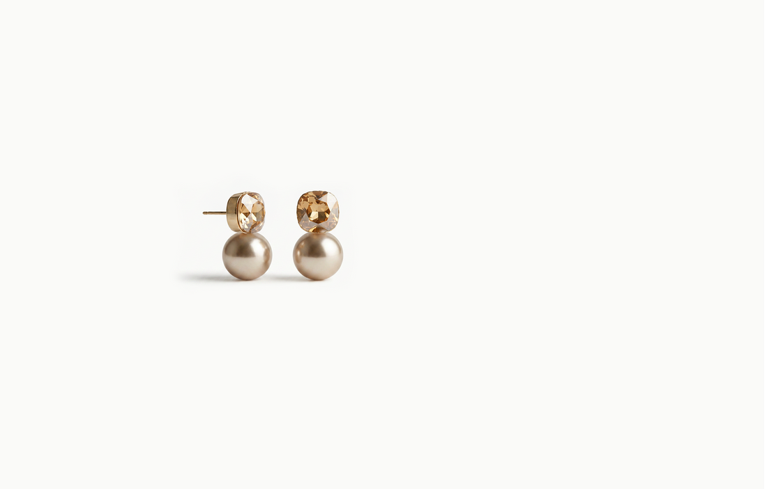 Gold stud earrings with a toffee brown crystal and a matching brown pearl