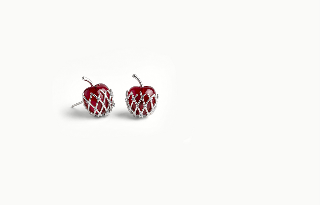 Red apple stud earrings wrapped in a silver lattice with crystals