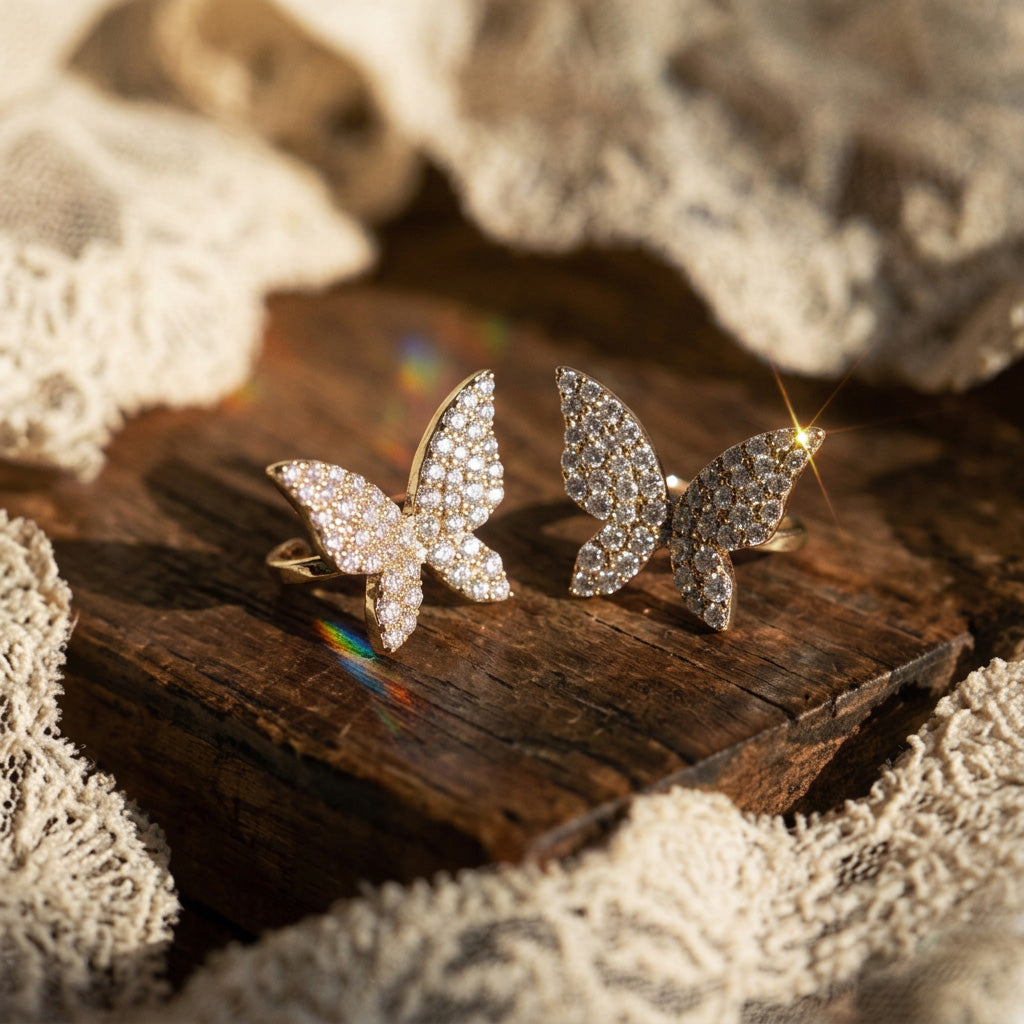 Honey Butterfly ear cuffs pair on rough wood and cream lace, gold butterflies covered in crystals
