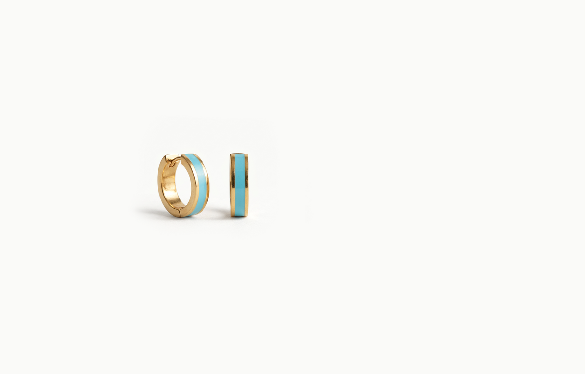 Riviera small hoop earrings; a pair of gold hoops with teal center bands on a white background