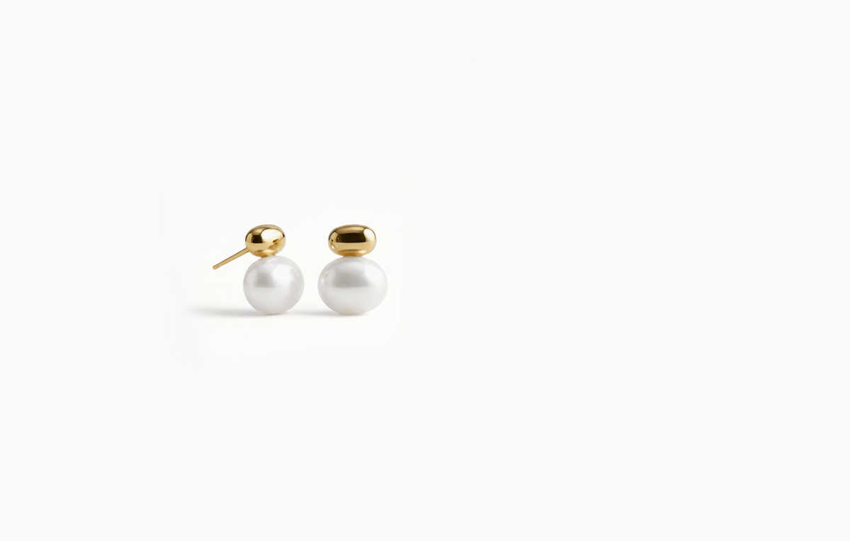 Large pearl stud earrings with a smooth gold cap