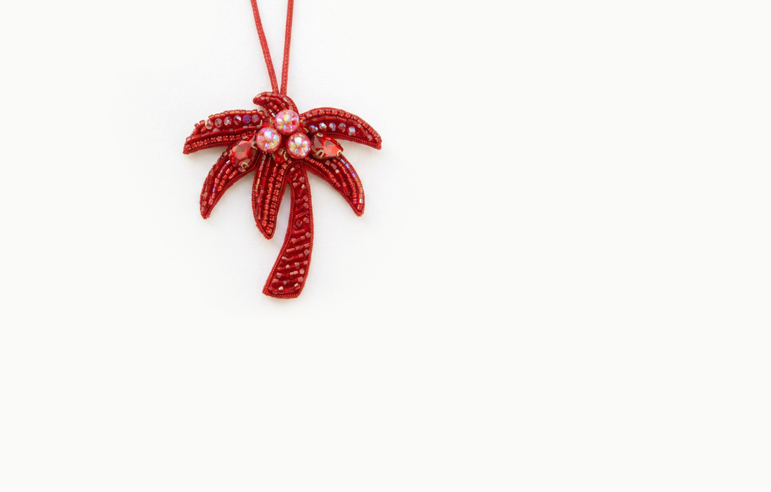 Red beaded palm tree bag charm