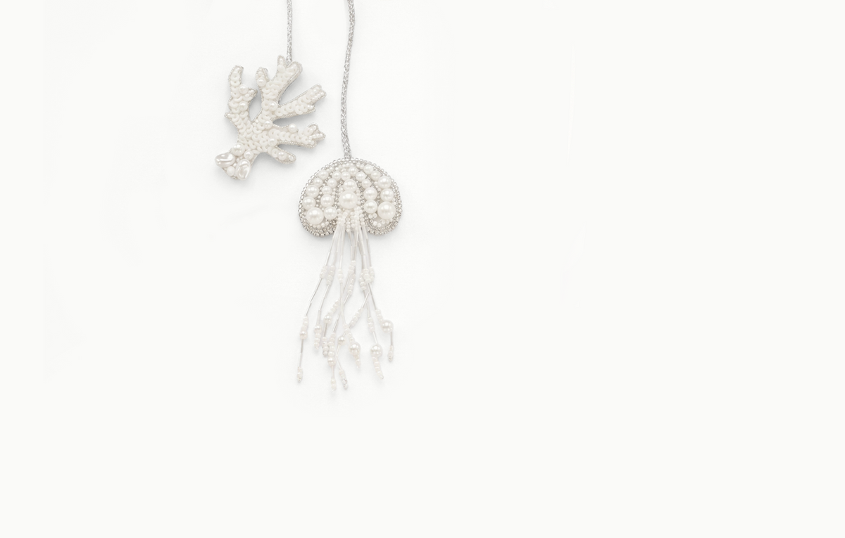 White beaded jellyfish and coral bag charm