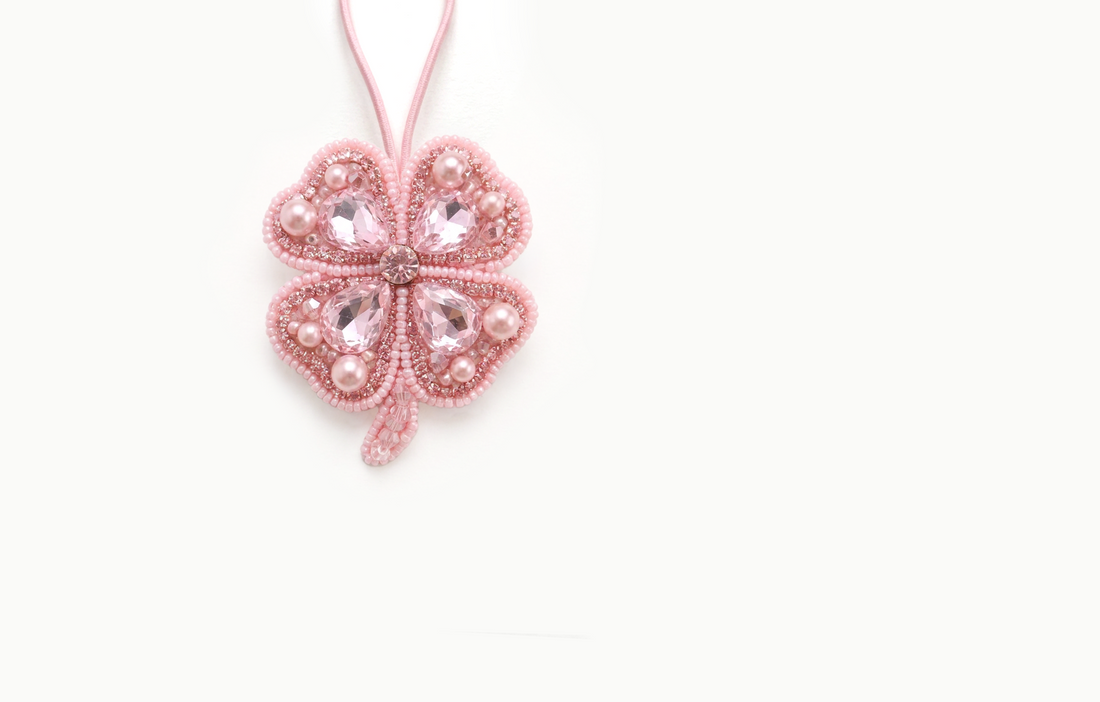 Pink beaded four leaf clover bag charm