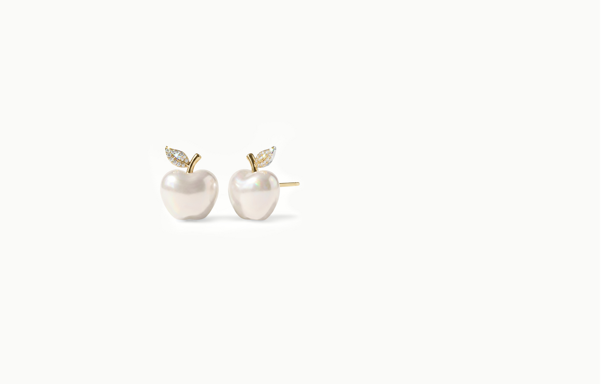 Pearl apple stud earrings with a gold stem and crystal leaf