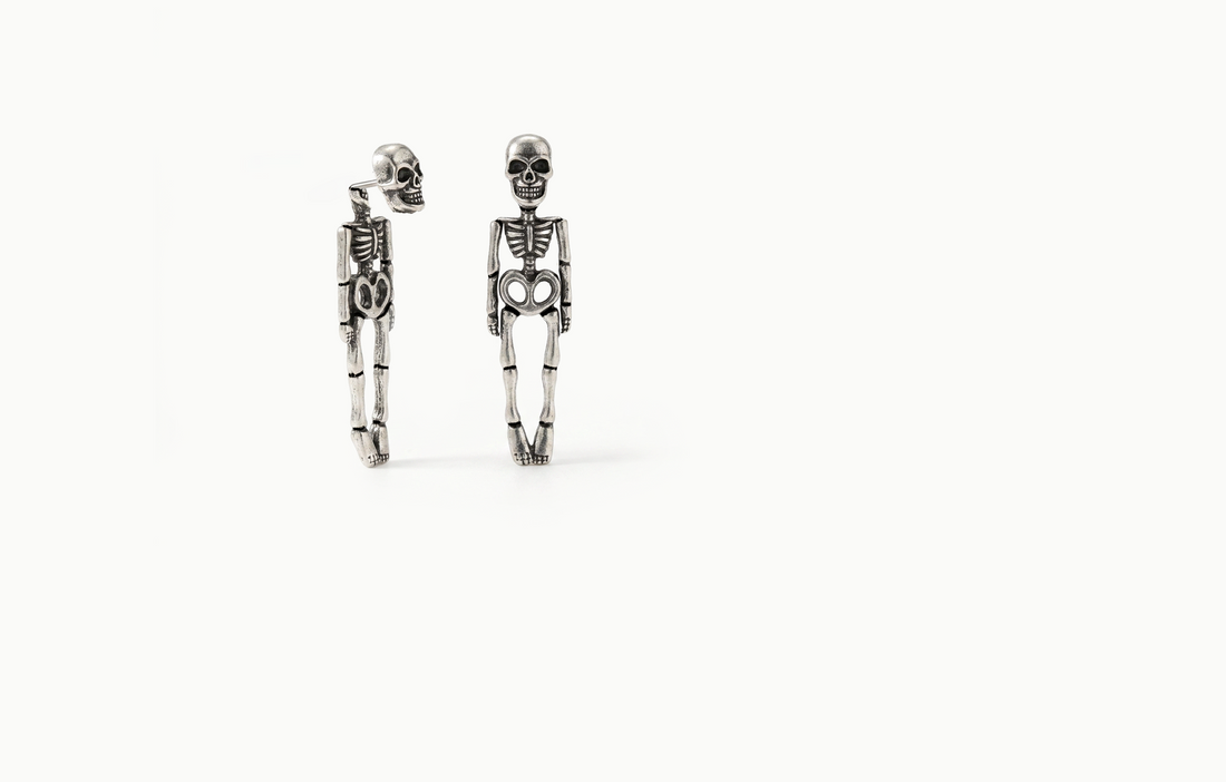 Silver skeleton drop earrings with a skull stud and hanging body