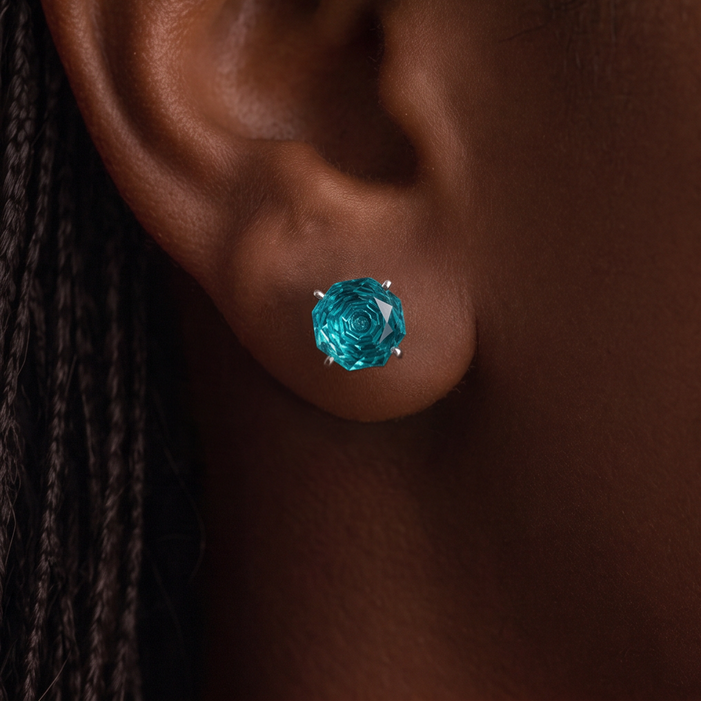 Algarve Crystal stud earrings worn on the ear, round teal crystal stud, braided hair