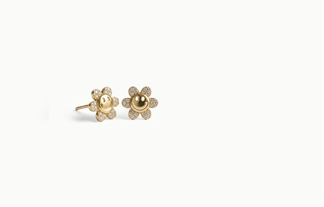 Gold smiley face flower stud earrings with crystal petals