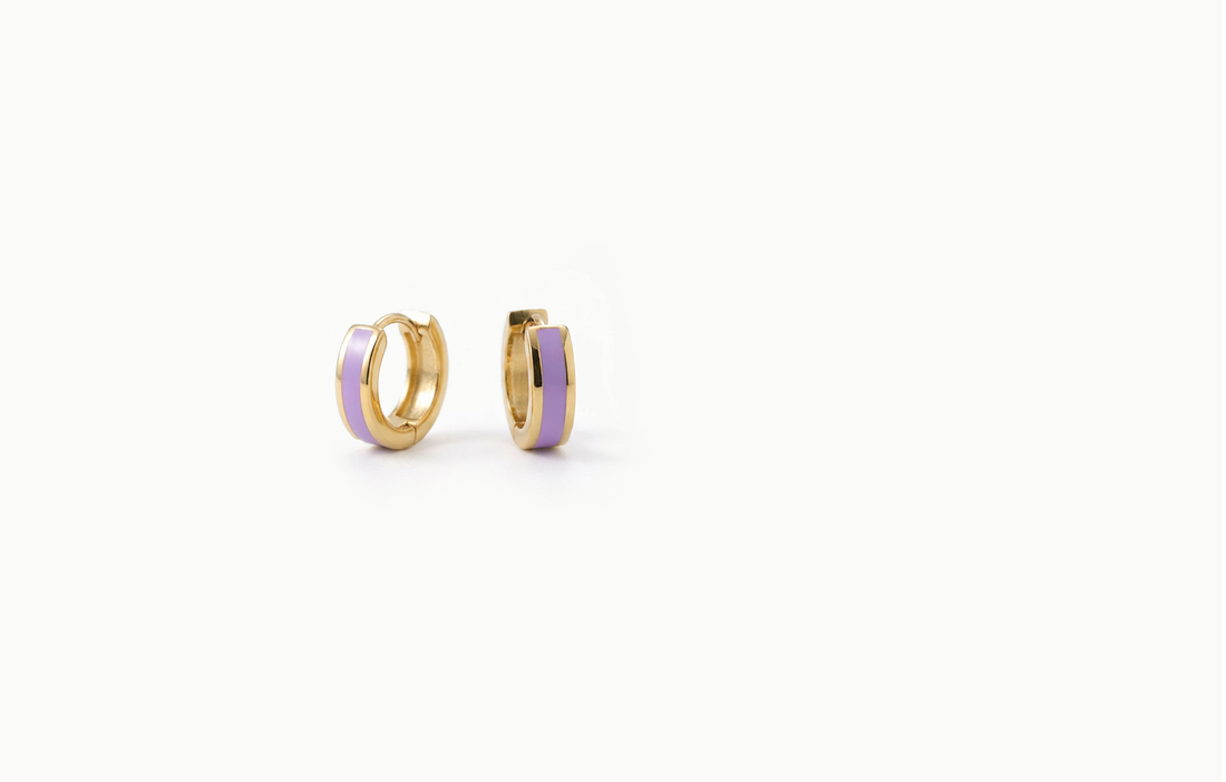 Chunky gold hoop earrings with a lilac inlay