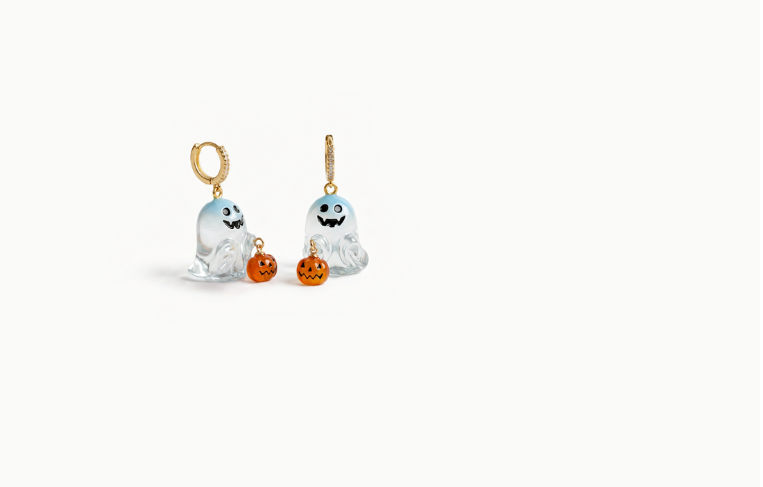 Gold crystal drop earrings with a translucent blue ghost holding an orange pumpkin