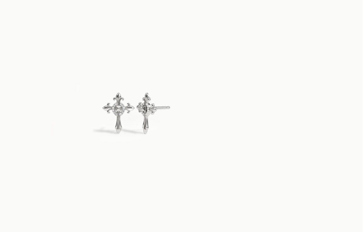 Long silver cross stud earrings with a pyramid stud and a ring of crystals