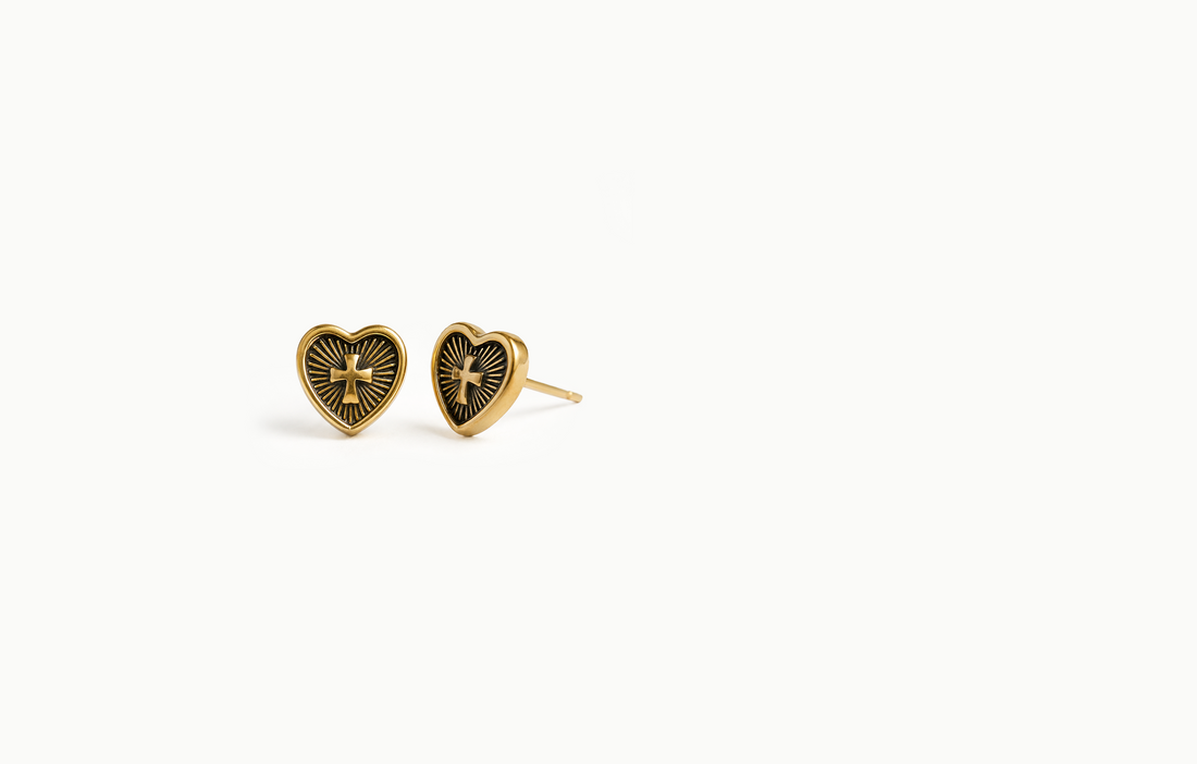 Vintage gold heart stud earrings with a cross and rays