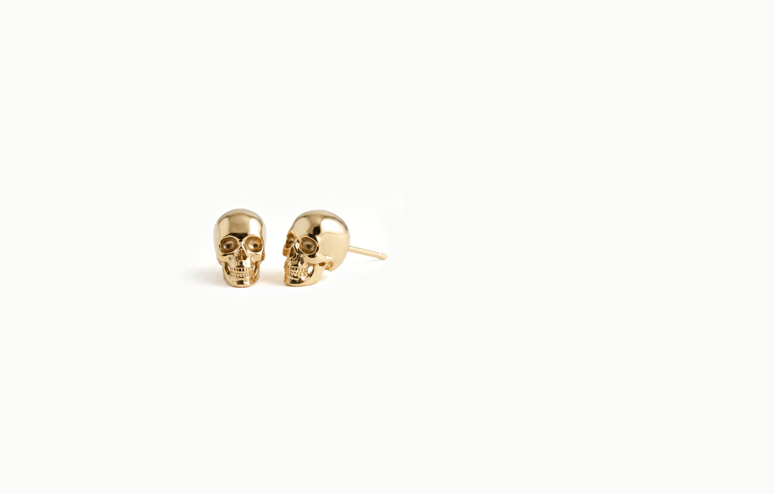 Gold skull stud earrings