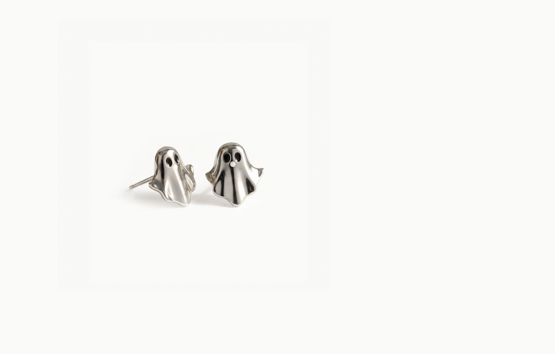 Silver ghost stud earrings with black eyes
